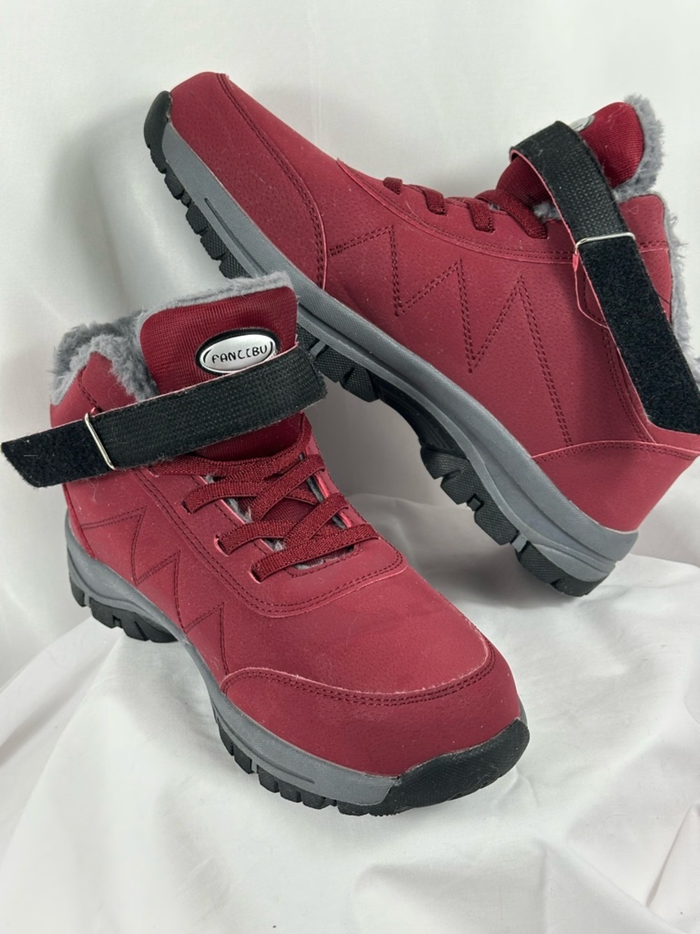 Funccbu size 42/10–10 1/2, a dark red fuzzy boot, hiking boot, mountain boot